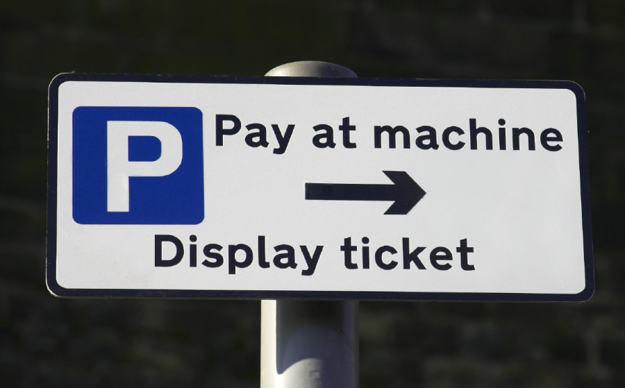 Pay at kiosk sign